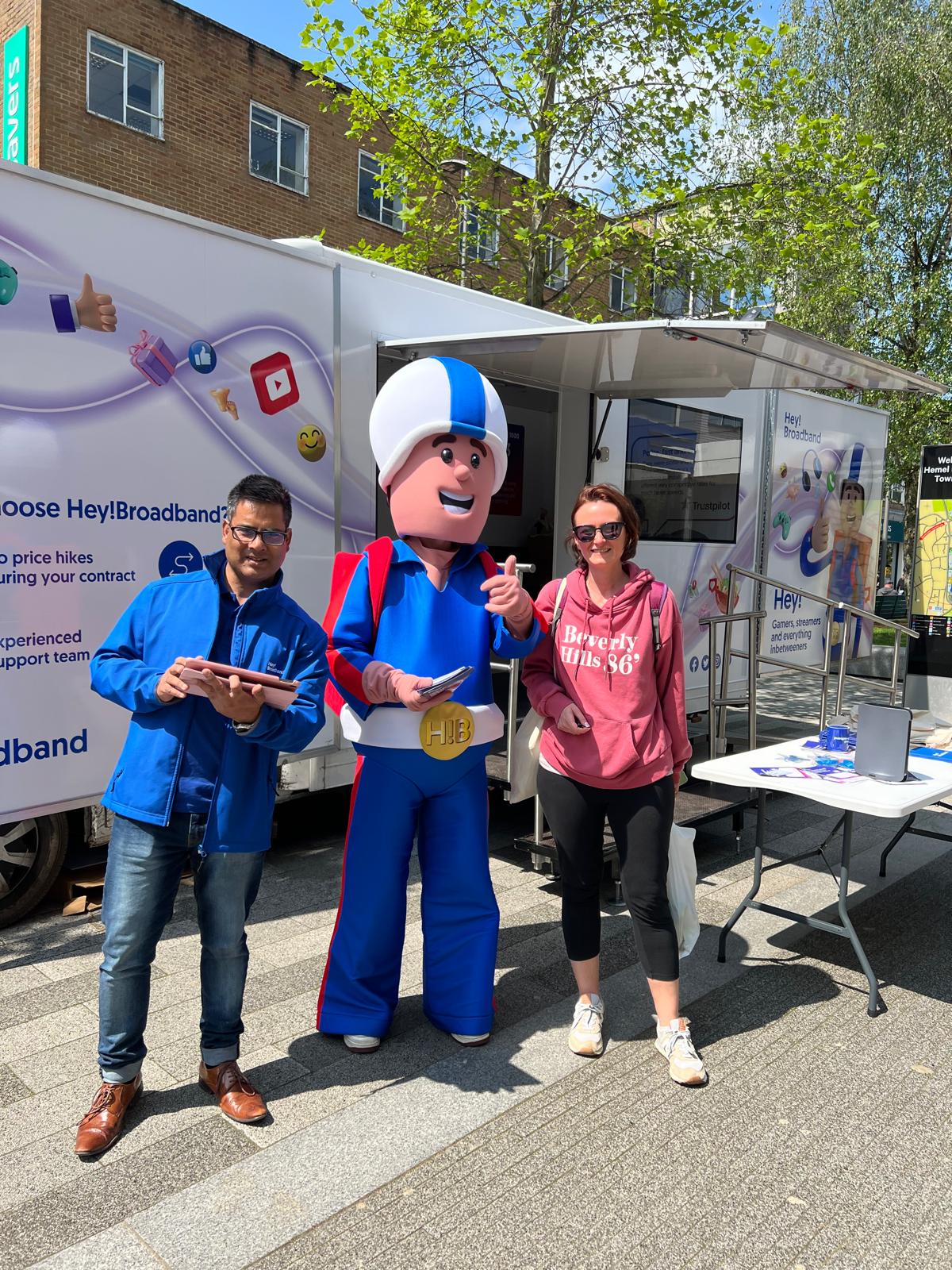 HC event activation team with branded gazebo and mascot